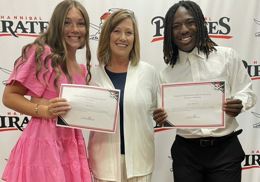 Riedel Foundation Administrator Sarah Deien presents two $2,500 scholarships in memory of George H. Riedel. Pictured are Abbie Martin, who won the scholarship for social advocacy, Deien, and Kyrie Wilkerson, who was awarded the scholarship for business and banking.